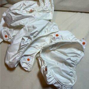 Newborn - size small 
Extra gPants gPouches

NWT 
6 qty